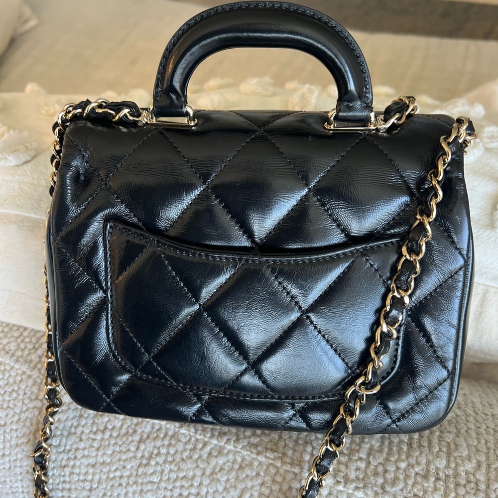 CHANEL Black Mini Quilted Bag with Gold Hardware - Picture 2 of 8